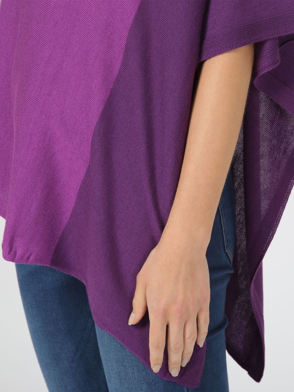 Poncho con dettaglio rigato