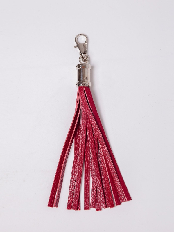 Charm con frange in pelle e dettagli sivler
