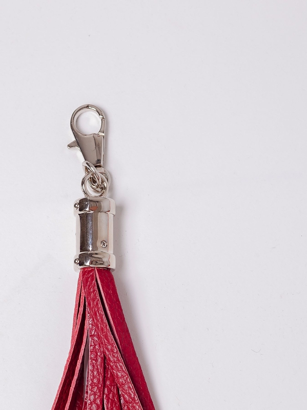 Charm con frange in pelle e dettagli sivler