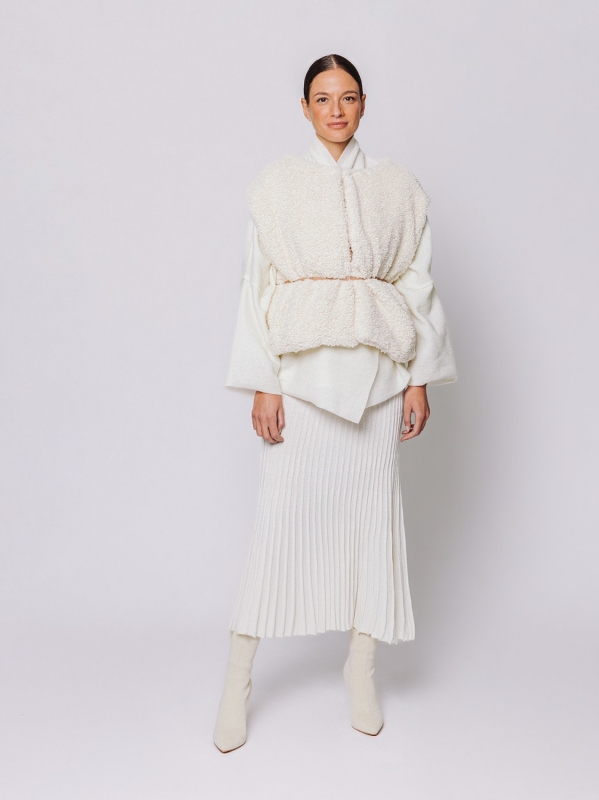 Eco-fur vest with bouclé workmanship