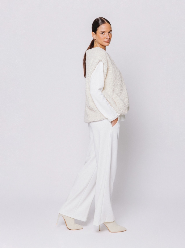 Eco-fur vest with bouclé workmanship