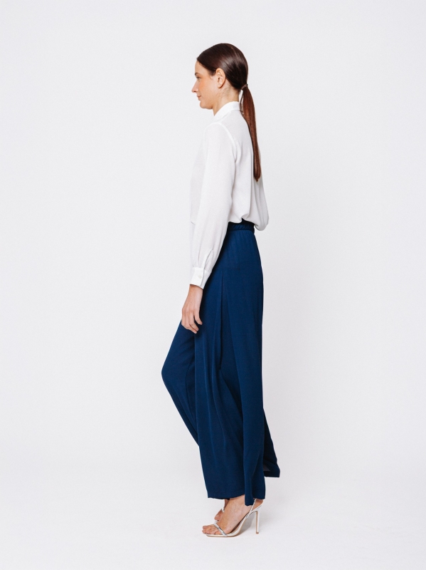 Pantalone in tripla georgette a palazzo con sfondo piega laterale