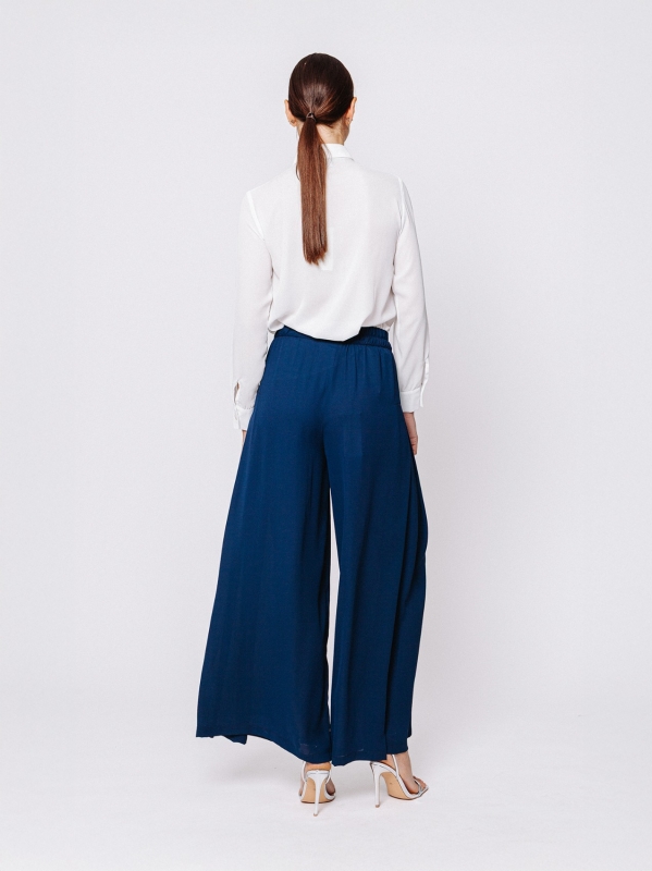 Pantalone in tripla georgette a palazzo con sfondo piega laterale