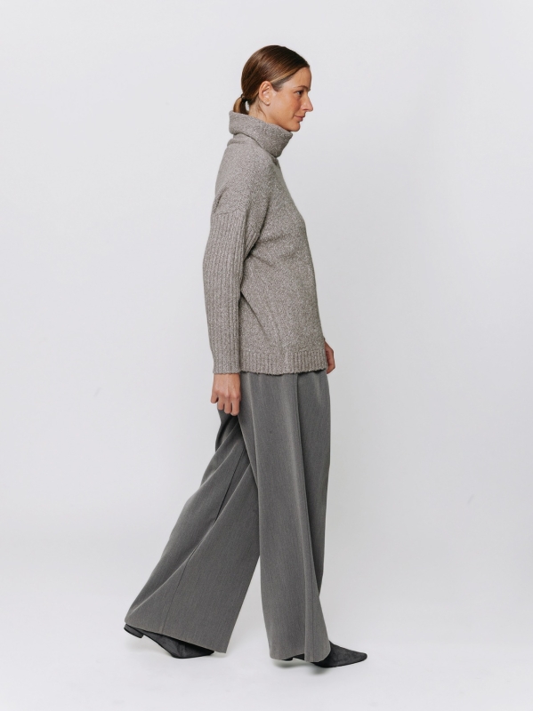 Melange sweater with high neck and ribbed sleeves
