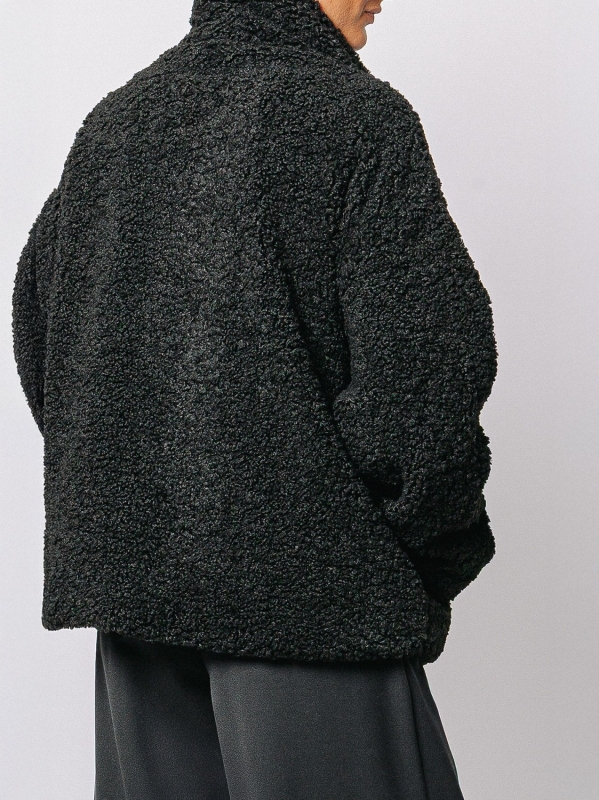 Eco-fur jacket with bouclé workmanship